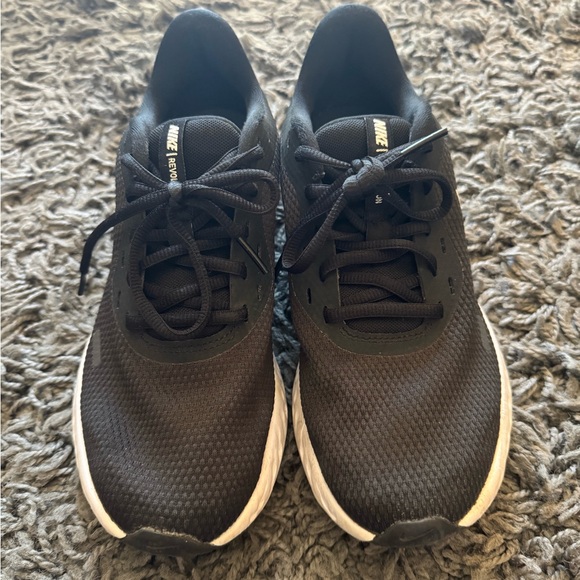 Nike Shoes - Nike women’s revolution Black Running Shoes